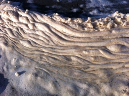 Foam on Newport beach.